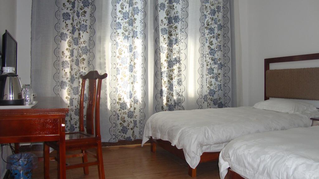 Faier Harbour Inn Dali  Rom bilde