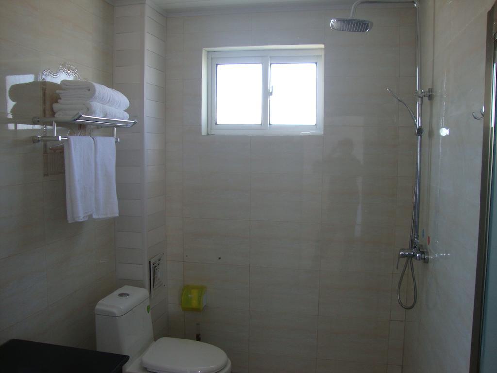 Faier Harbour Inn Dali  Rom bilde
